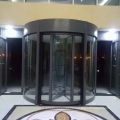 Three-wing glass revolving door